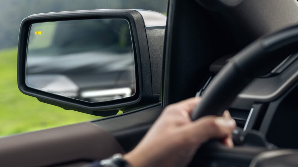 Closeup on the Drivers Side Mirror of the GMC Sierra LD