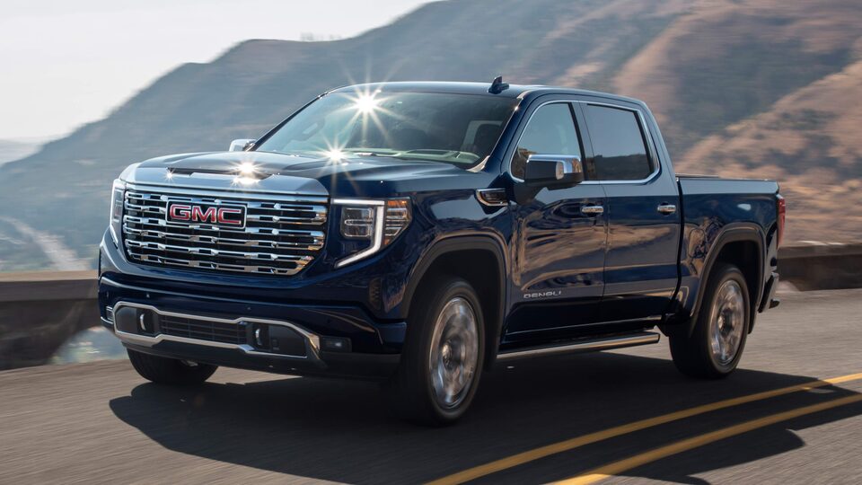 The Stunning GMC Sierra LD Driving On-Road During the Day