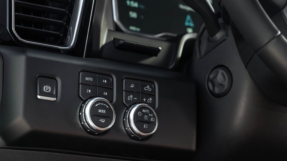 A Closeup on unique features next to the Steering Wheel of the GMC Sierra LD