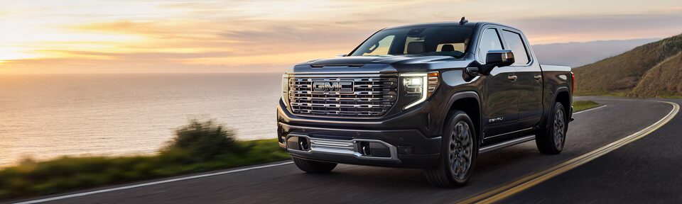 The 2023 Sierra Taking a Cruise on a Coastal Road