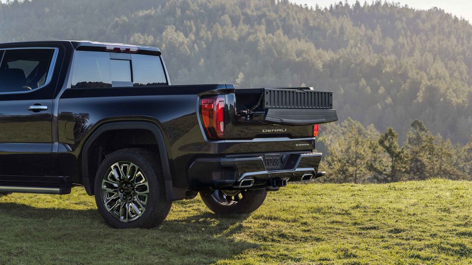 1 of 6 Convenient Functions of the 2023 Sierra LD Pickup Trucks MultiPro Tailgate