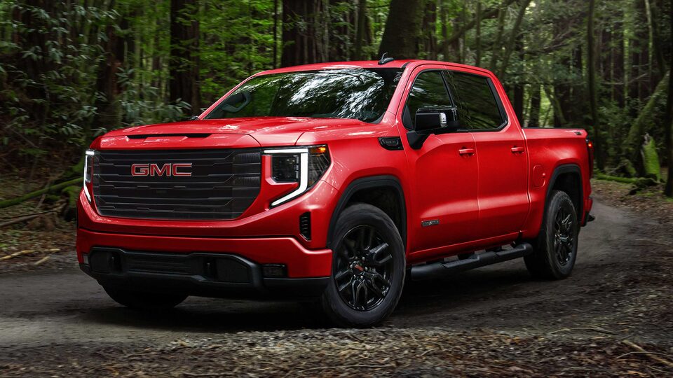 The Sierra 1500 Cruising Through a Dense Woodland Trail