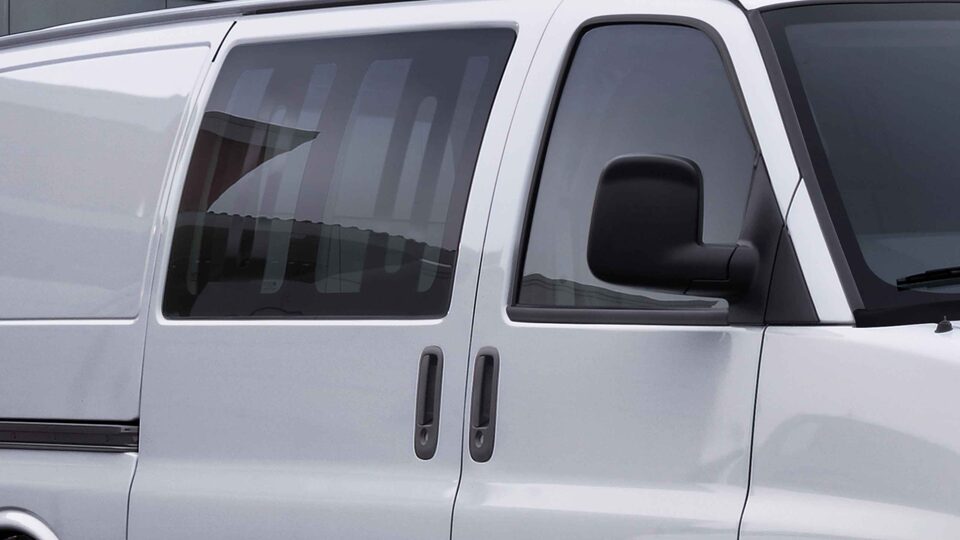 Closeup on Solar-Ray Deep-Tinted Glass on the 2023 GMC Savana Cargo Van