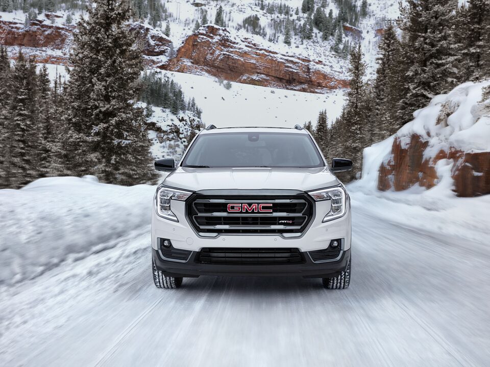 A Head-On Shot of the GMC Terrain Driving Off-Road in Snow