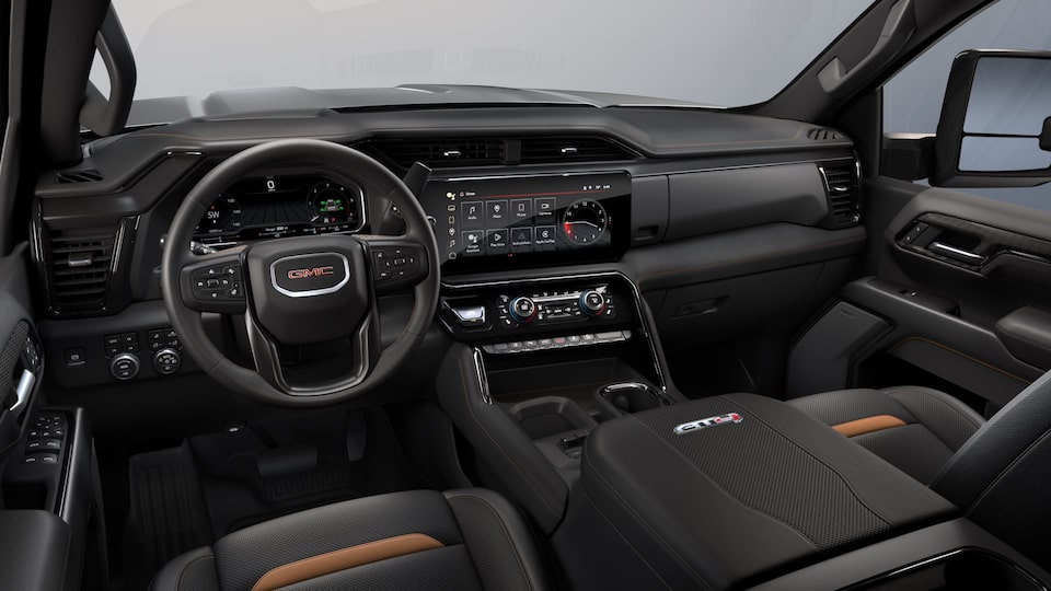 The Jet Black Interior with the Steering Wheel and Infotainment System on the GMC Terrain AT4