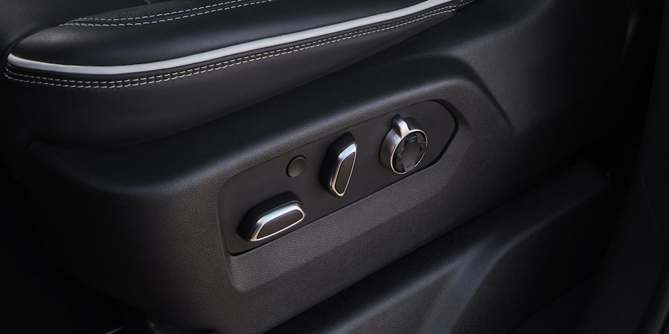 The Front Seat Adjustment Toggles of the Sierra HD AT4