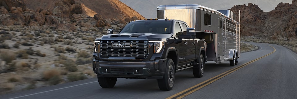 The Sierra Denali Towing an RV with Ease While on an Open Roadway
