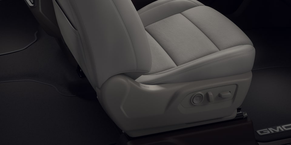 Side Shot of the 2024 GMC Sierra 1500 SLE Gray Passenger Seat with Controllers
