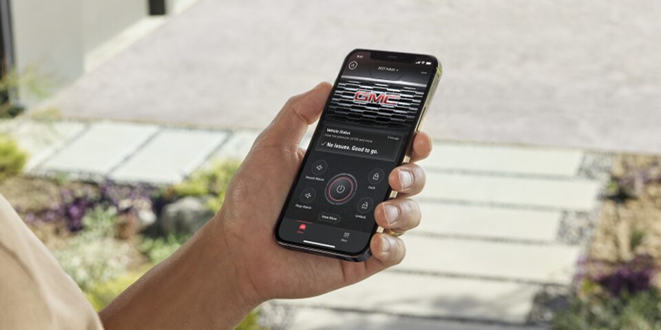 A Person Using the myGMC App on Their Smartphone