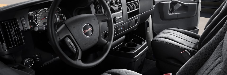 A Driver's Side View of the Front Cabin of the GMC Savana Passenger