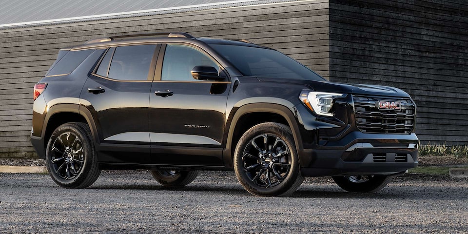 2025 GMC Terrain Small SUV Parked in Front of a Building