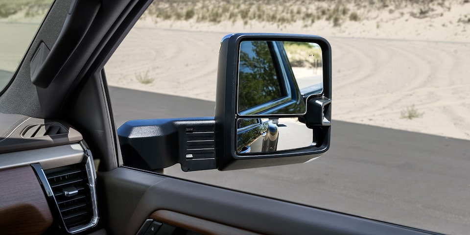 Close-up View of the Passenger Side Mirror on a 2025 GMC Sierra HD Truck