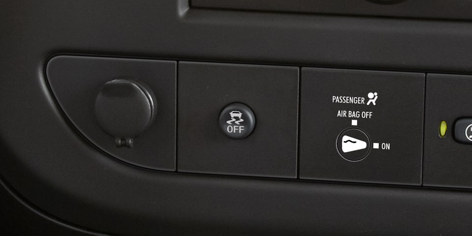 Close-Up of the Stabilitrak Button in a 2025 GMC Savana Passenger Van