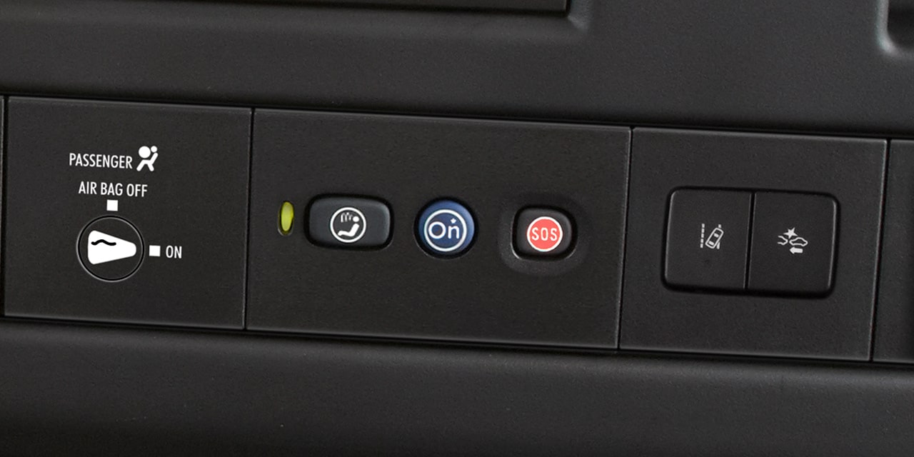 Close-Up View of OnStar and Emergency Services Buttons in a 2026 GMC Cargo Passenger Van