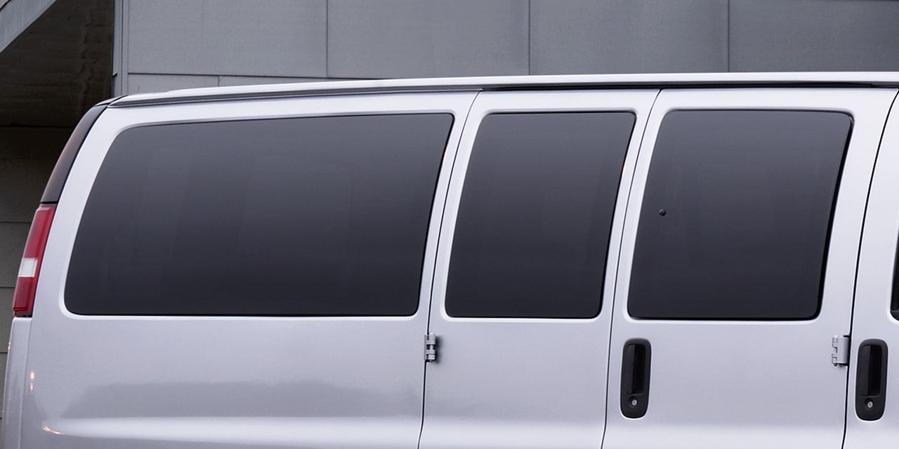 Close-up of the Tinted Windows on a 2026 GMC Savana Passenger Van