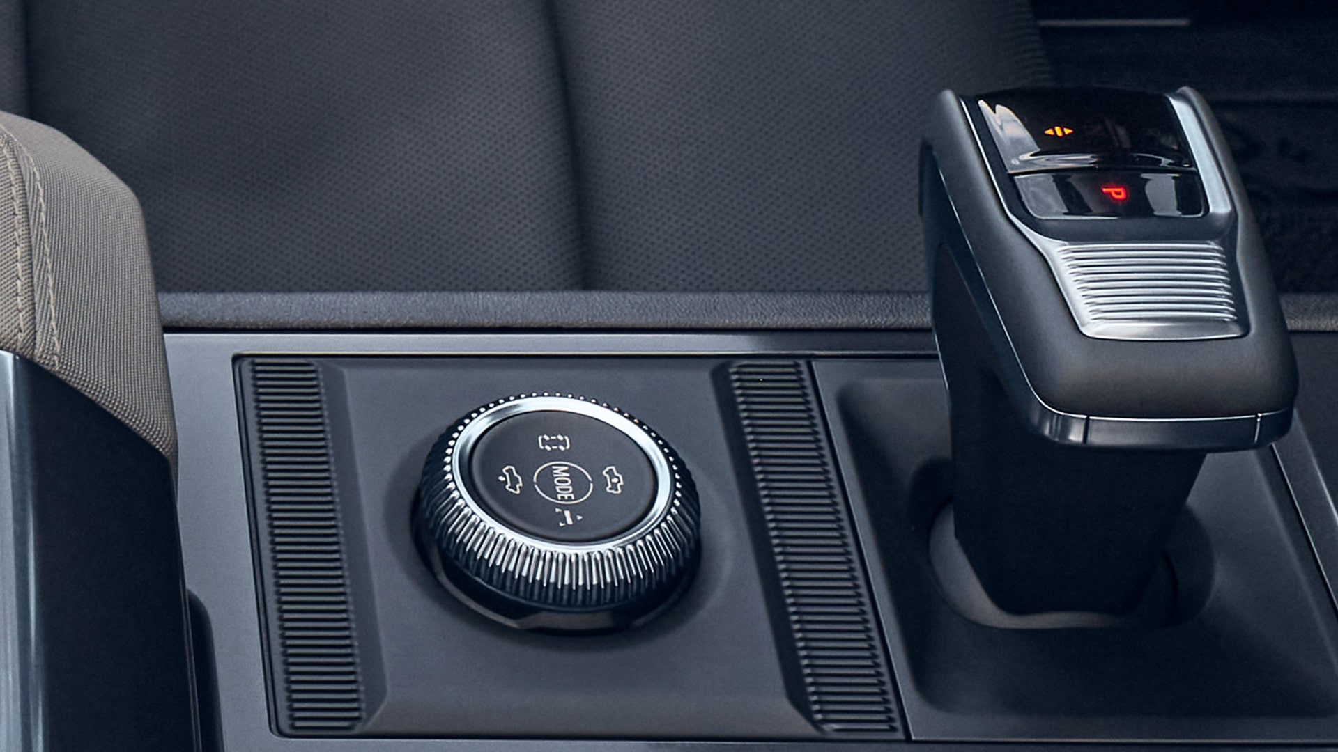 Close-up of the 2026 GMC HUMMER EV Selectable Driver Modes Dial and Shifter