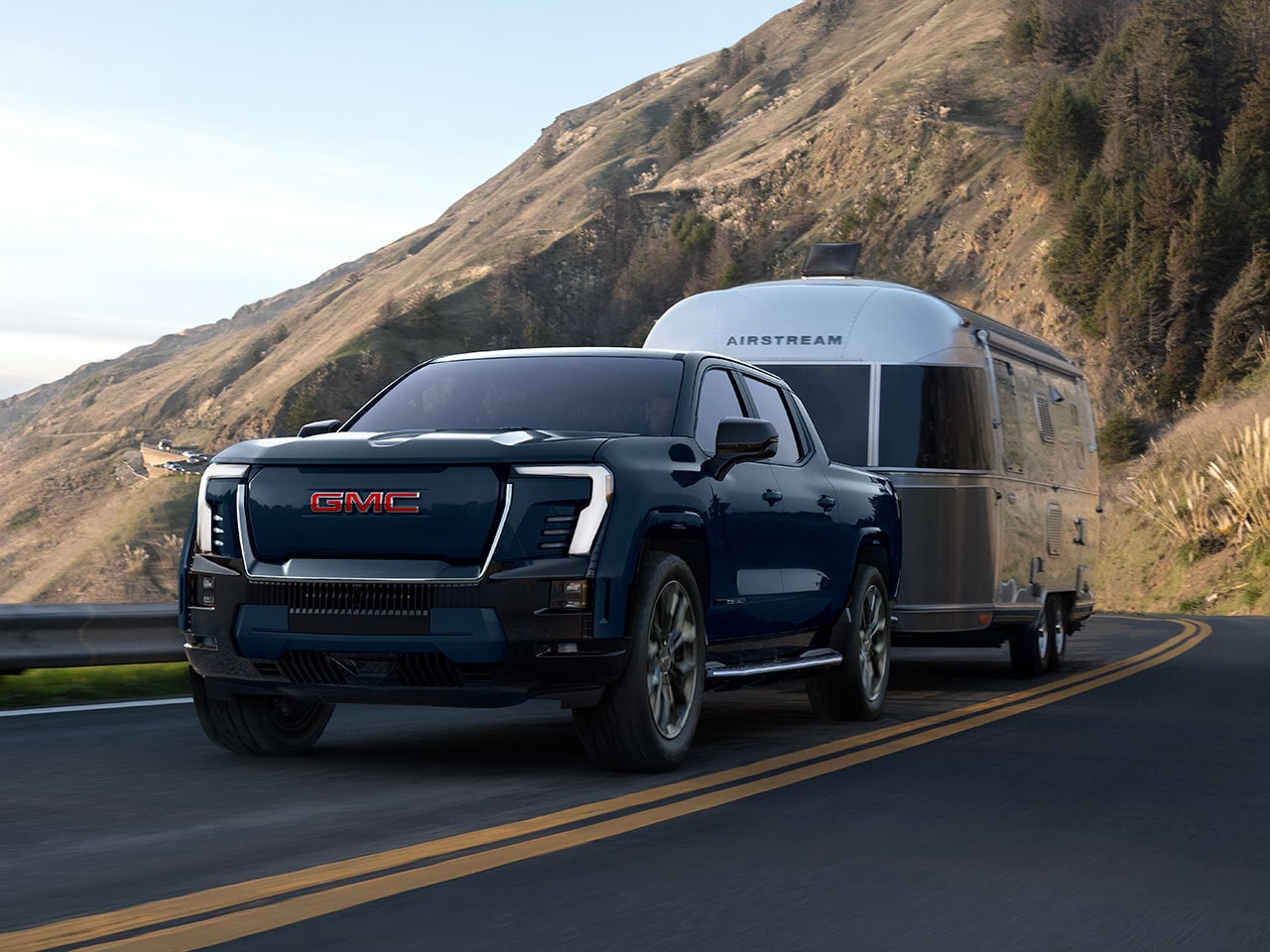 The 2026 GMC Sierra EV Denali Towing an Airstream RV