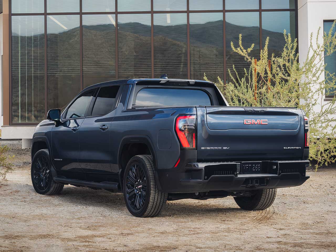 Rear View of the 2026 GMC Sierra EV Elevation EV Pickup Truck Parked