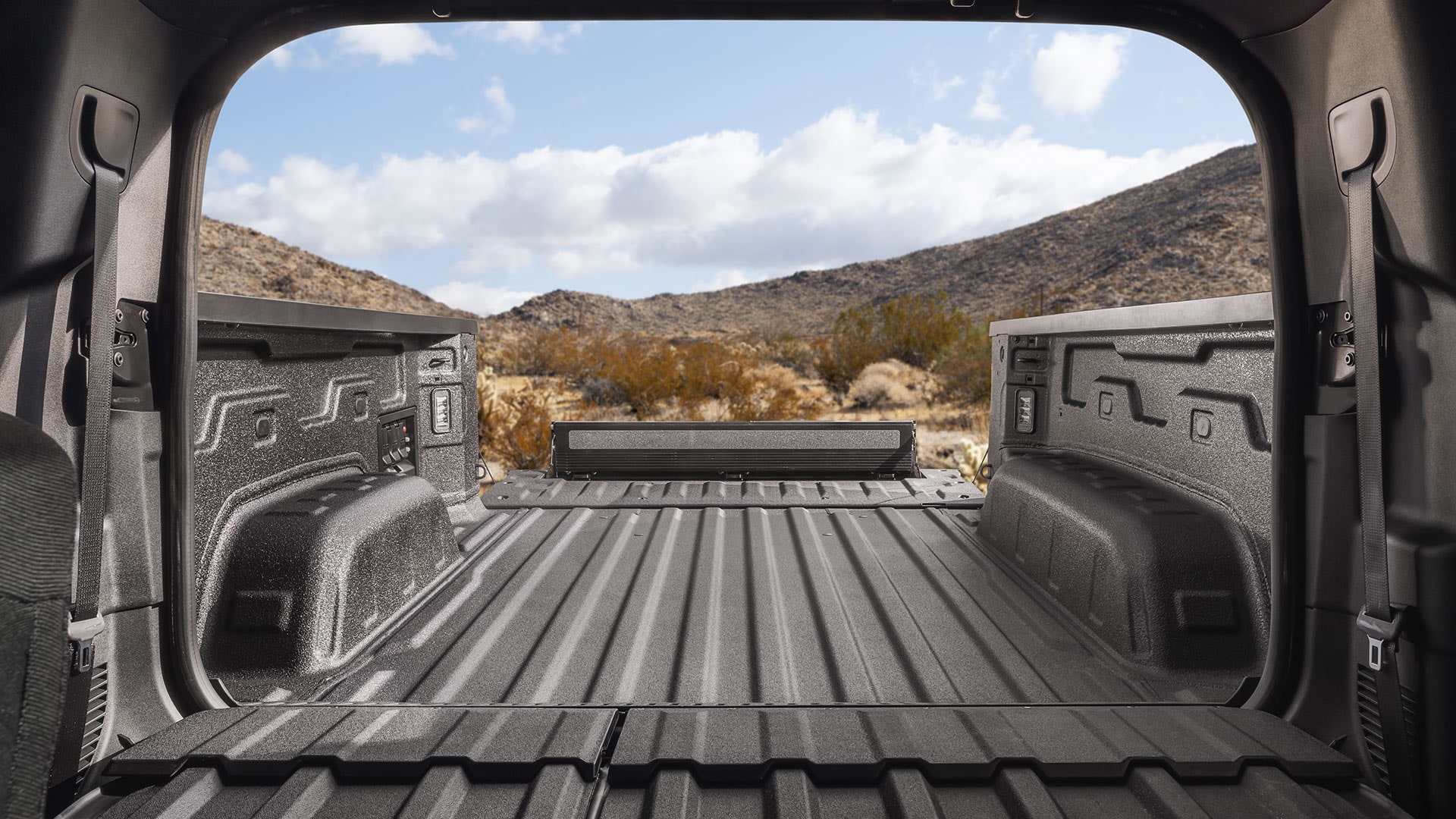 Interior View of the Spray-on Bedliner in the Truck Bed of the Sierra EV Elevation Pickup Truck