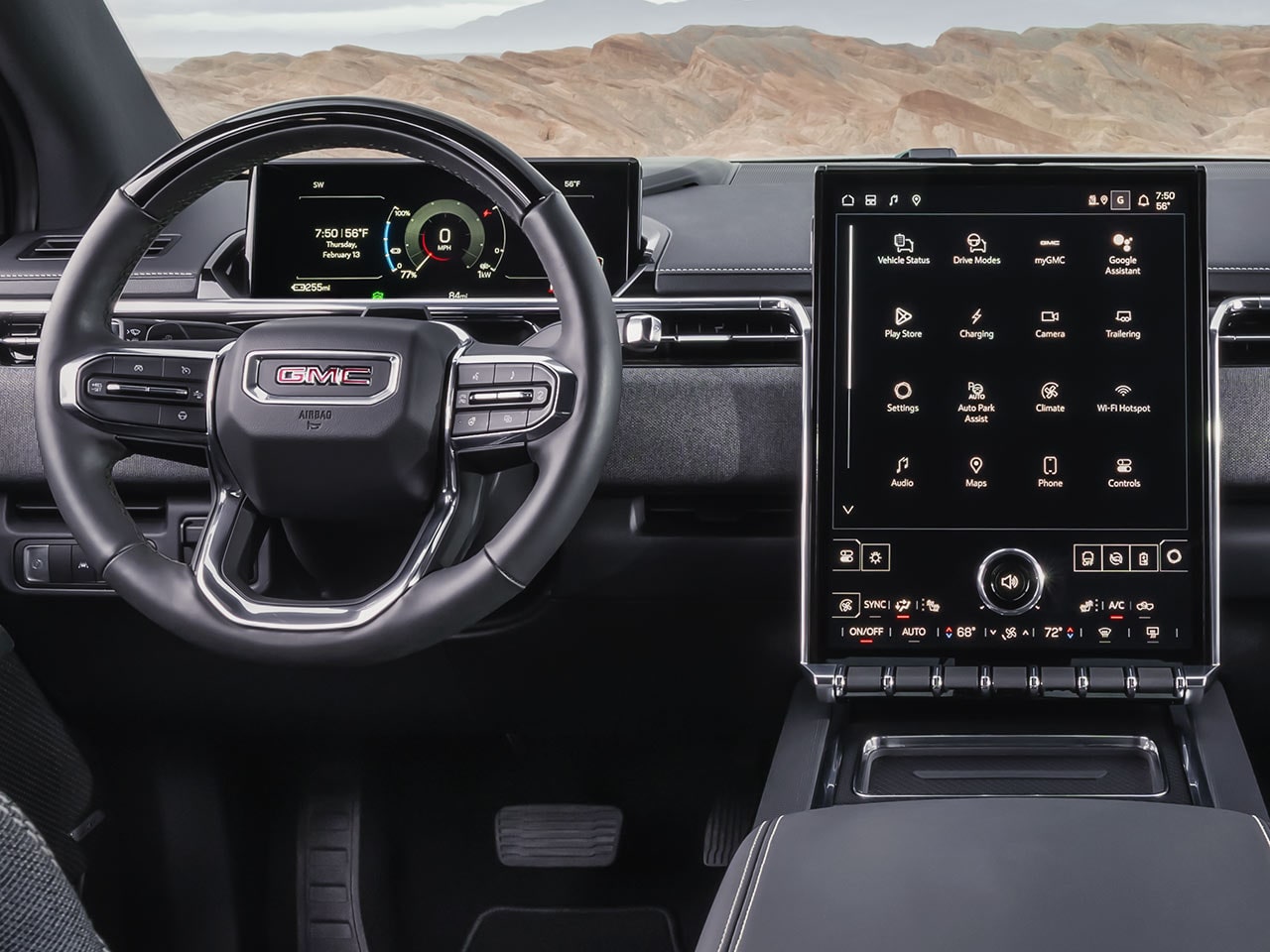 Interior View of the Steering Wheel and Infotainment System in the 2026 GMC Sierra EV Elevation