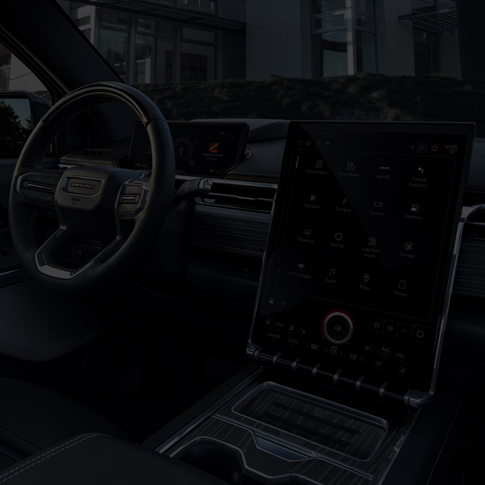 The 2026 GMC Sierra EV's Driver Side Dashboard, Infotainment System, and Center Console