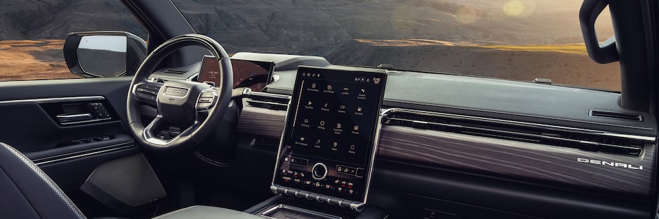 The 2026 GMC Sierra EV Pickup Truck Interior Dashboard and Steering Wheel