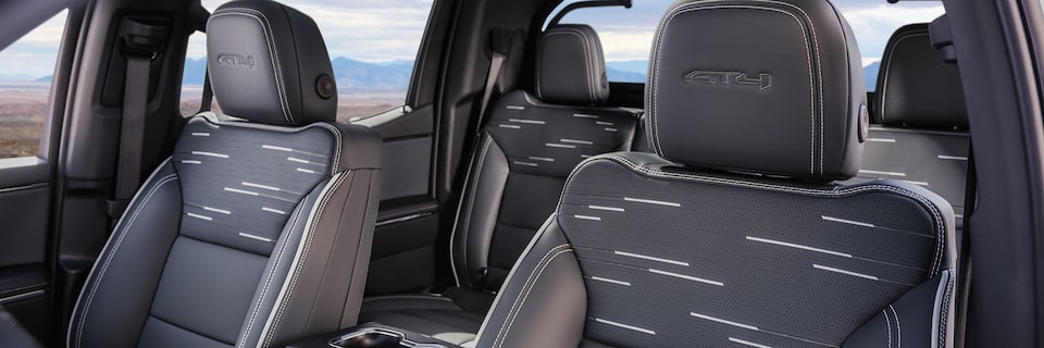 Close-up of the 2026 GMC Sierra EV Stitching and Premium Seating of the Front and Back Row