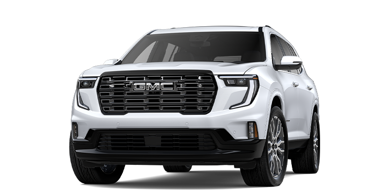 Front Three-Quarters View of a White 2026 GMC Acadia Mid-Size SUV Driving Down a Long Driveway