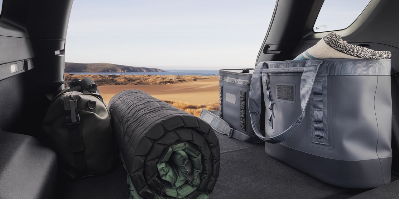 An Interior View Inside the 2026 GMC Terrain AT4 Looking Out the Open Tailgate