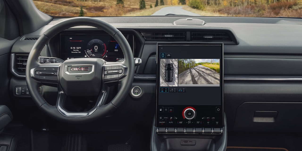 Interior View of the Dashboard, Steering Wheel, and Infotainment System in the 2026 GMC Terrain AT4 Small Off-Road SUV