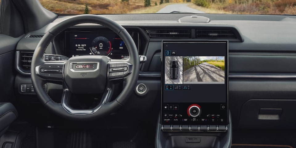 Interior View of the Dashboard, Steering Wheel, and Infotainment System in the 2026 GMC Terrain AT4 Small Off-Road SUV