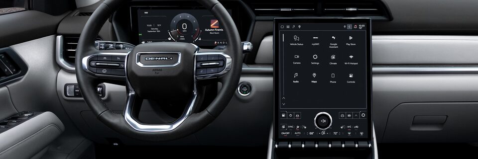 Interior View of the Steering Wheel and Infotainment System in the 2026 GMC Terrain Denali Luxury SUV