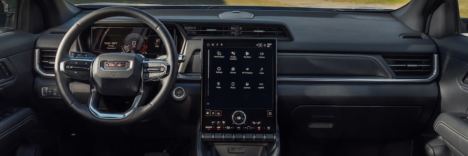 Interior View of the Dashboard, Steering Wheel and Infotainment System in the 2026 GMC Terrain Elevation Compact SUV