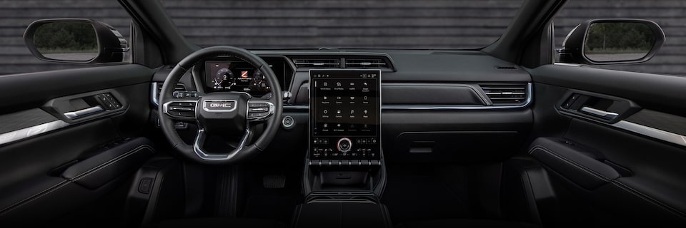 Interior View of the Dashboard, Steering Wheel, and Infotainment System in the 2026 GMC Terrain Denali Luxury Compact SUV