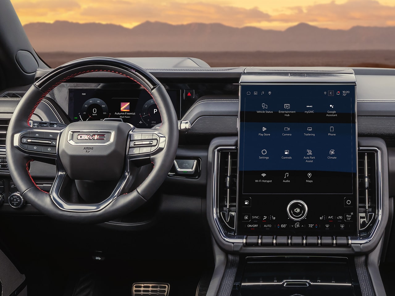 Close-up Interior View of the Steering Wheel, Dashboard, and Infotainment System in the 2026 GMC Yukon AT4 Full-Size Off-Road SUV
