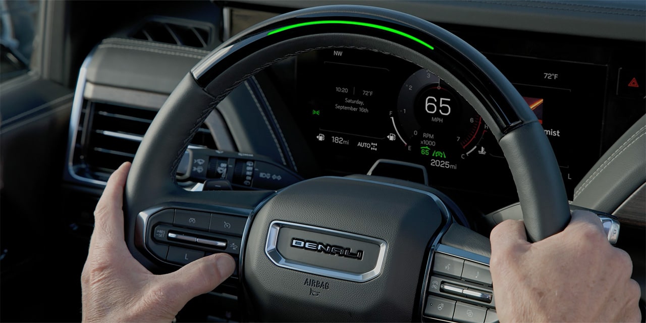 A Man Using the Super Cruise Hands-Free Driving Tech in the 2026 GMC Yukon AT4 Ultimate Full-Size Off-Road SUV