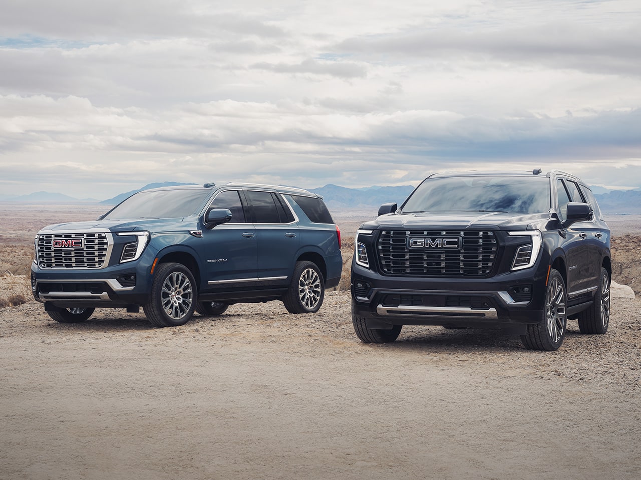 2026 GMC Yukon and Yukon XL parked side by side