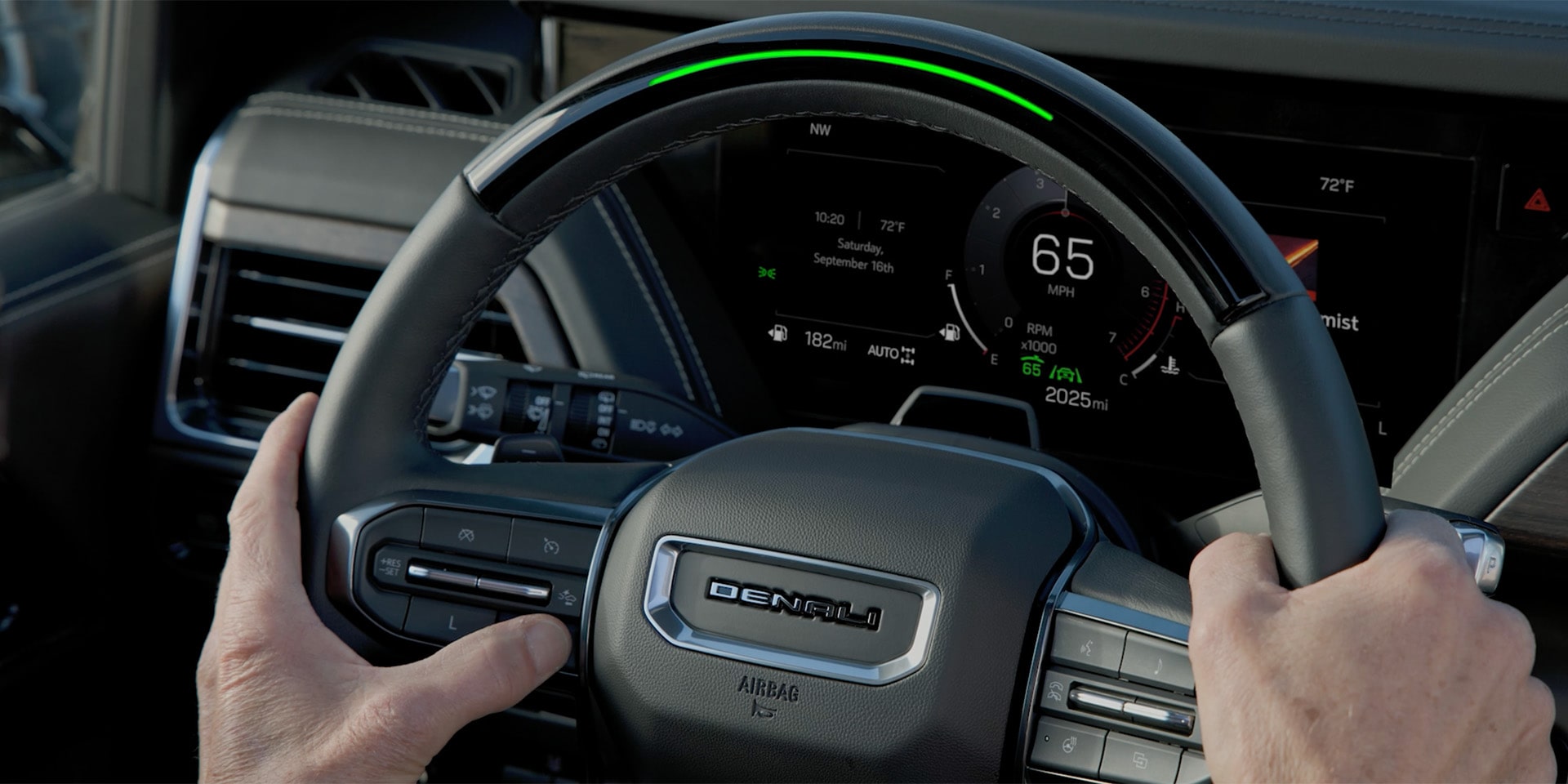 A Man Using the Super Cruise Hands-Free Tech in His 2026 GMC Yukon Large SUV