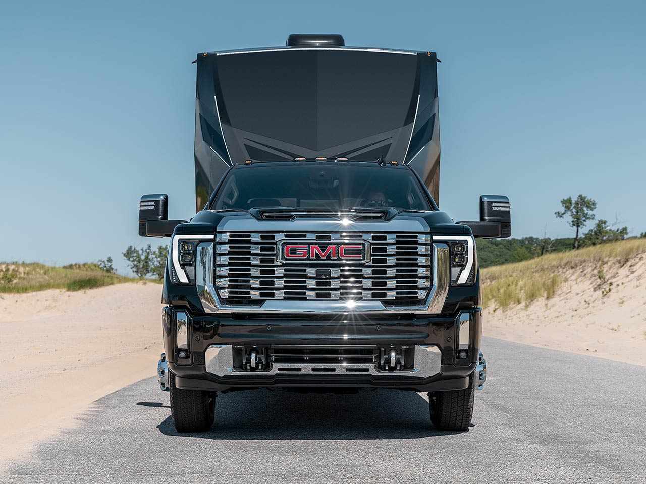 2026 GMC Sierra HD towing an RV
