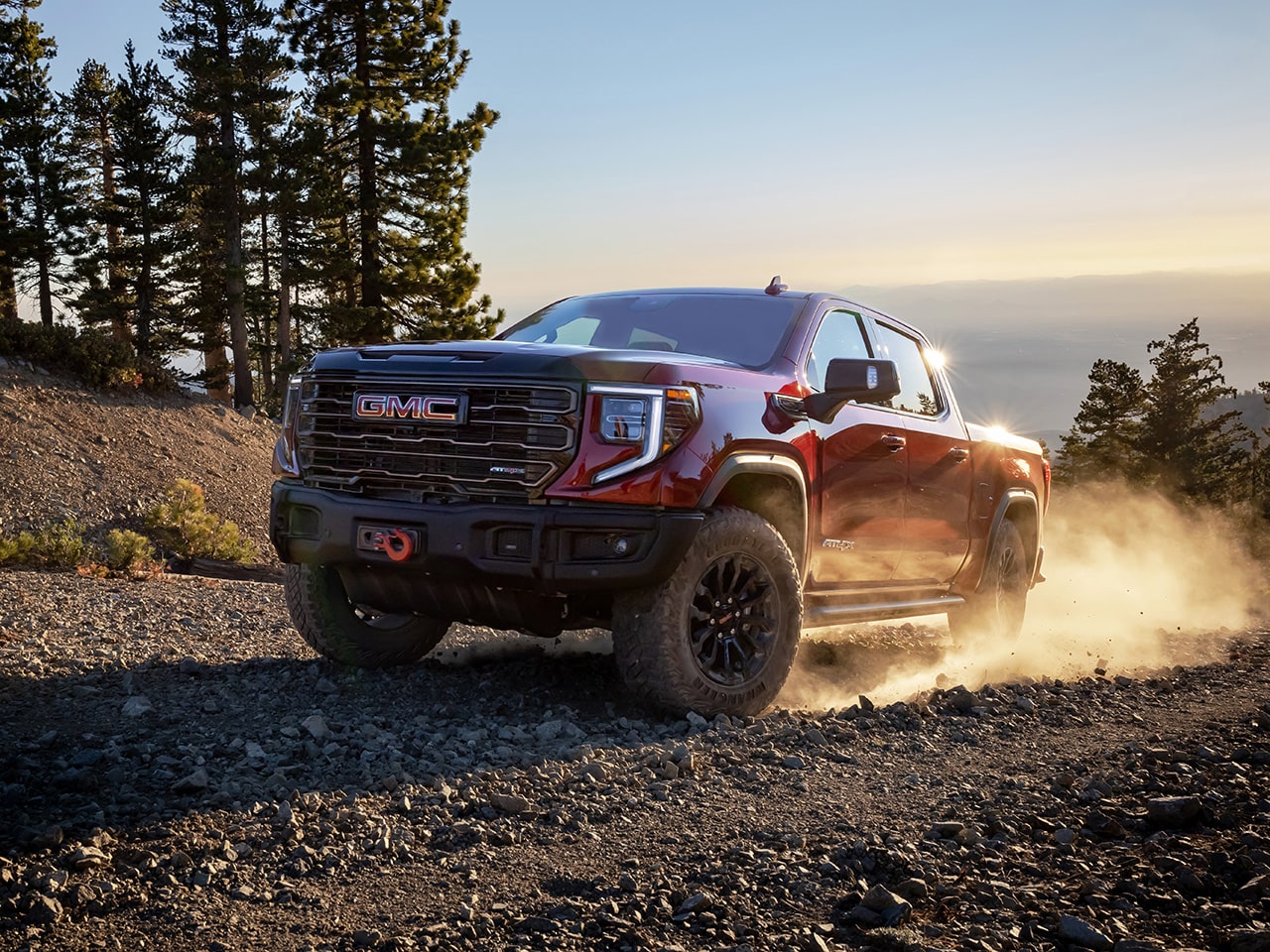 The 2026 GMC Sierra AT4 Off-Road Truck Speeding Down a Dirt Road with Ease