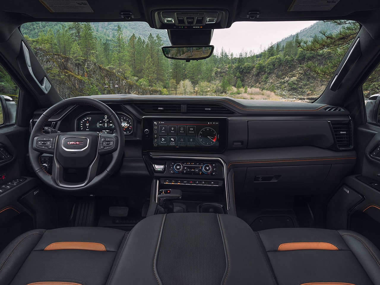 Interior View of the Dashboard and Infotainment System in the 2026 GMC Sierra AT4 Off-Road Truck, Kalahari color