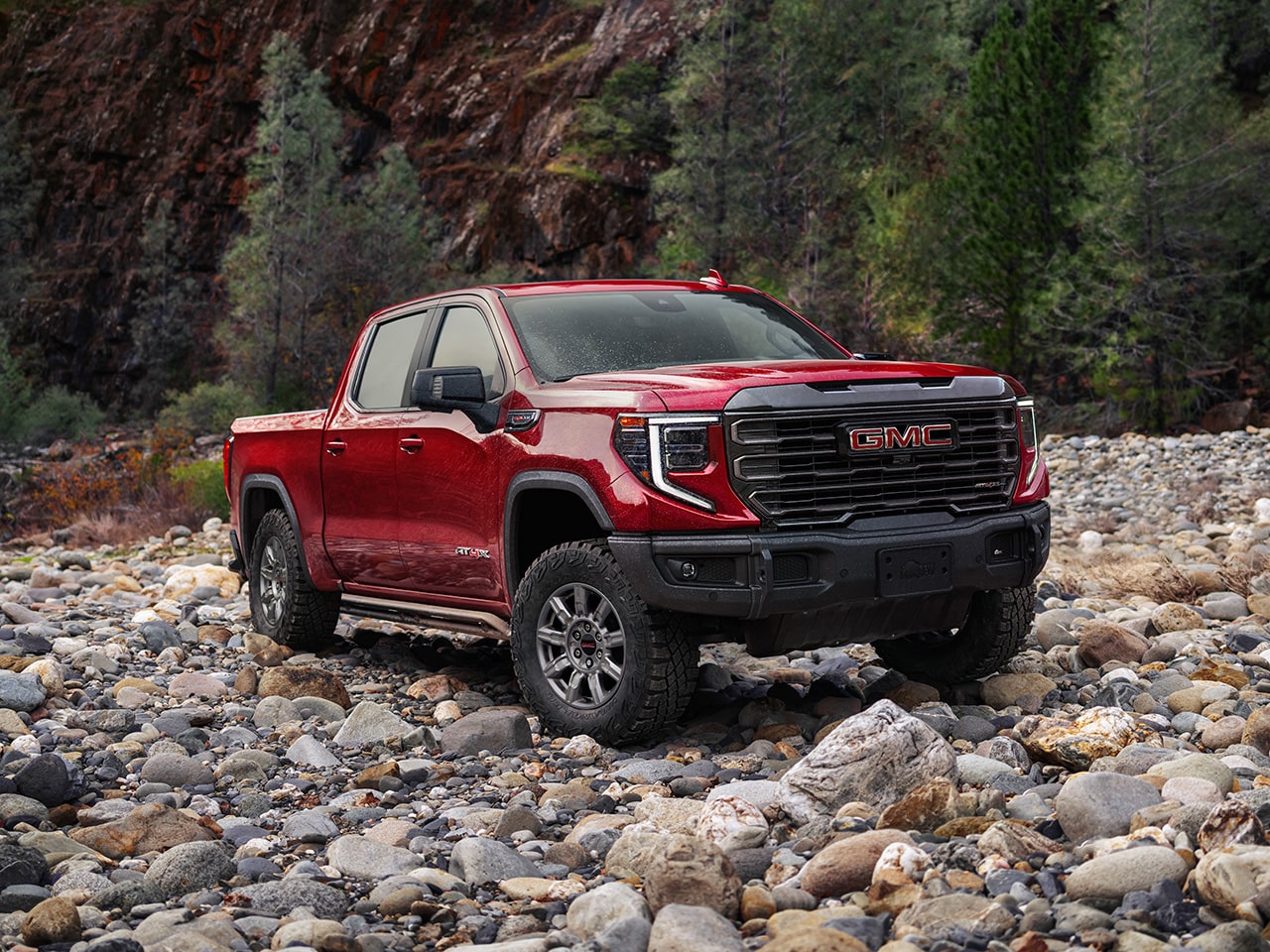 The GMC Sierra AT4 and At4X Off-Road Trucks Parked Side by Side