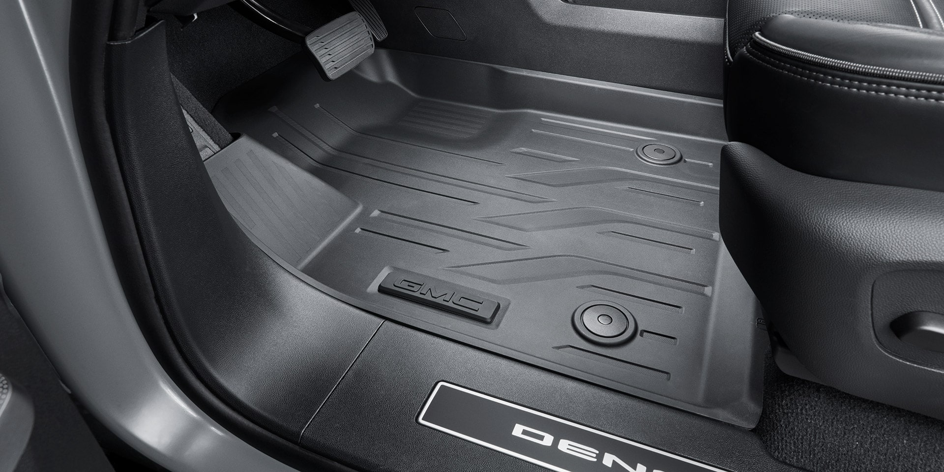 Durable All-weather Floor Liners Protecting the Interior of a GMC Sierra EV