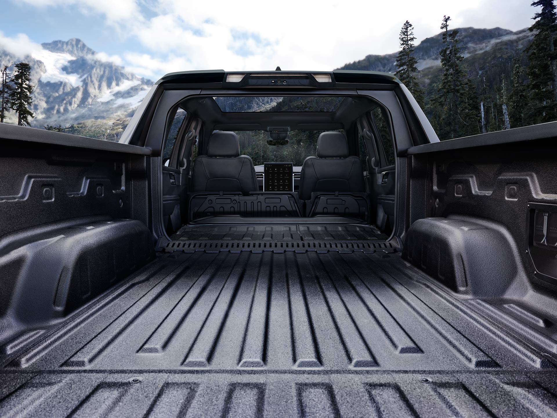 The Spacious GMC Sierra EV Denali Truck Bed Featuring the Versatile MultiPro Midgate
