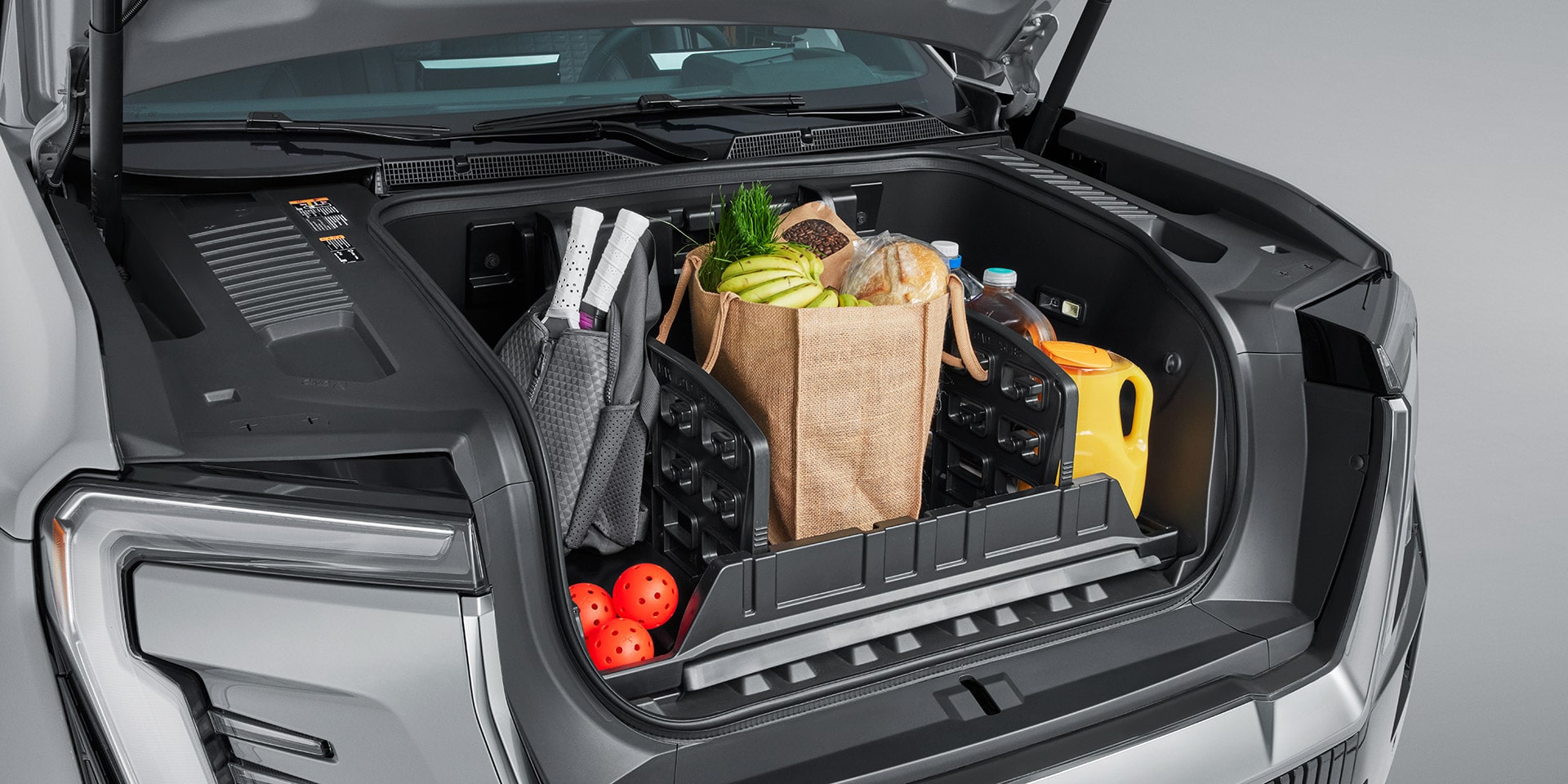 The Versatile Cargo capacity Within the Front eTrunk of a GMC Sierra EV Truck
