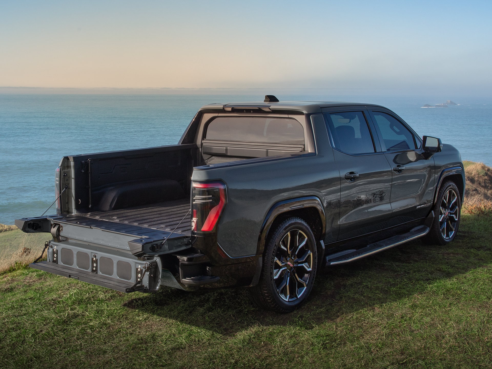 The 2027 GMC Sierra EV Denali Features a Full Width Step for Enhanced Cargo Accessibility