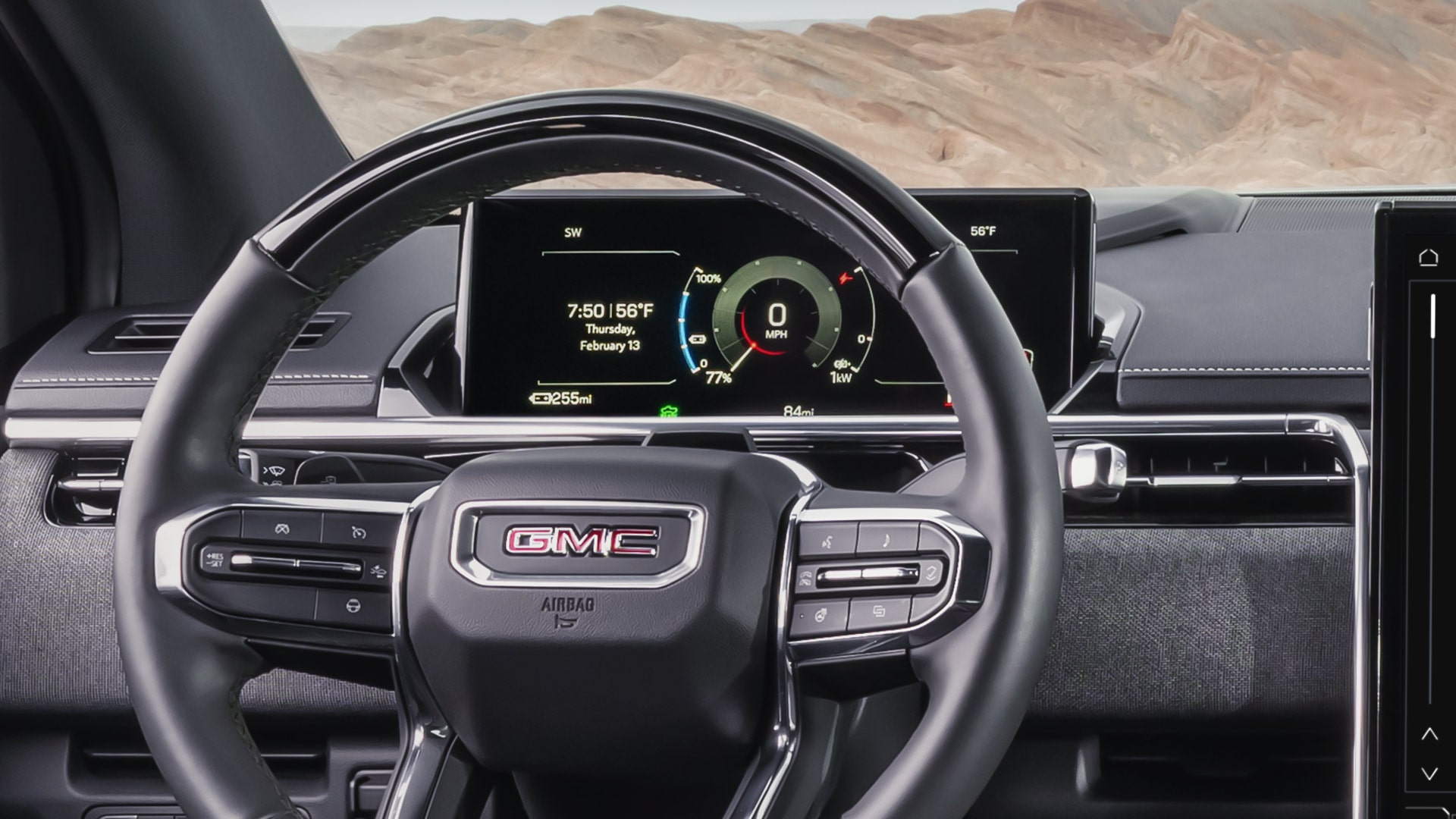 The Digital Driver Information Center Displays Essential Vehicle Performance Data within a Premium GMC Cabin