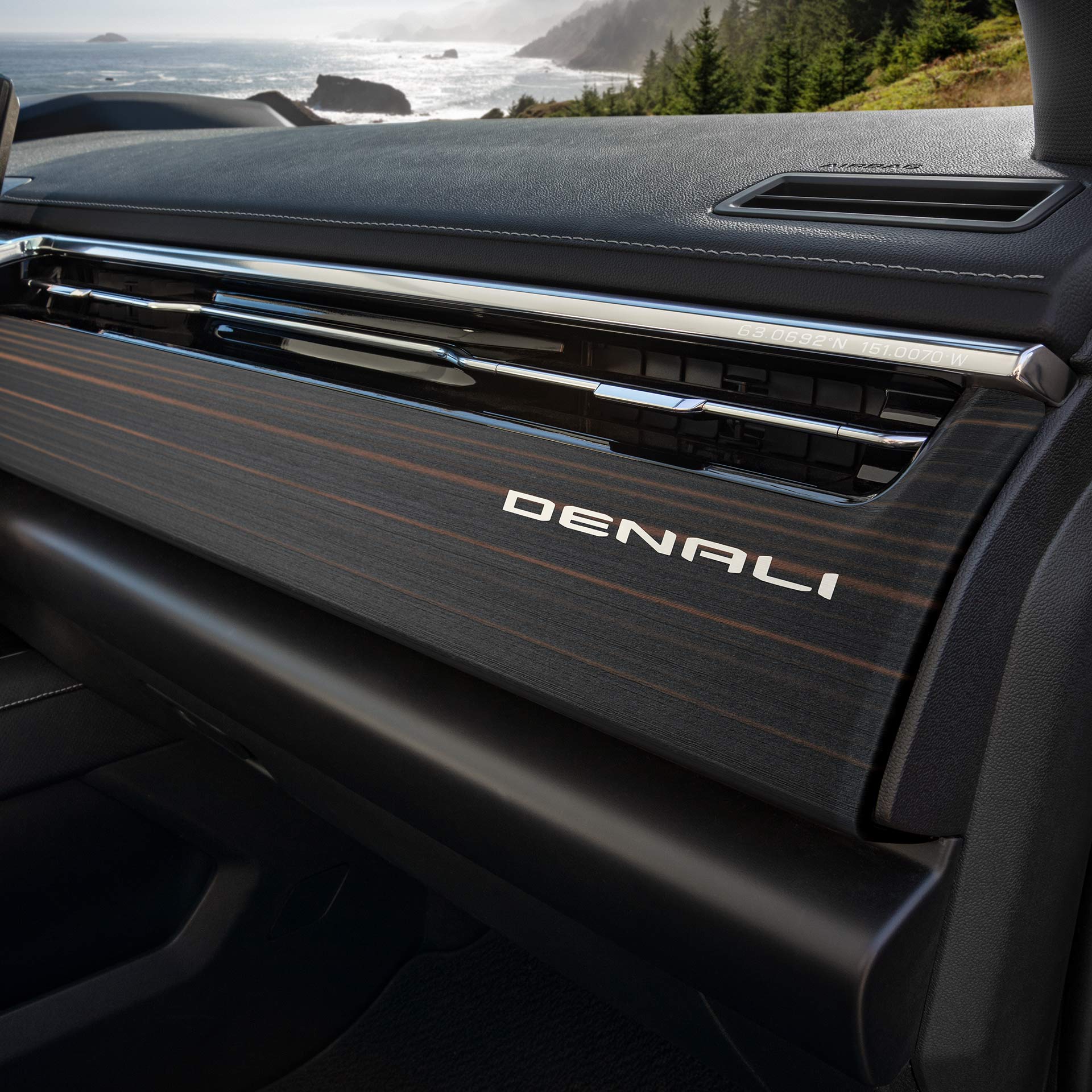 A Premium Wood Grain Dashboard Trim Featuring the Iconic GMC Denali Emblem