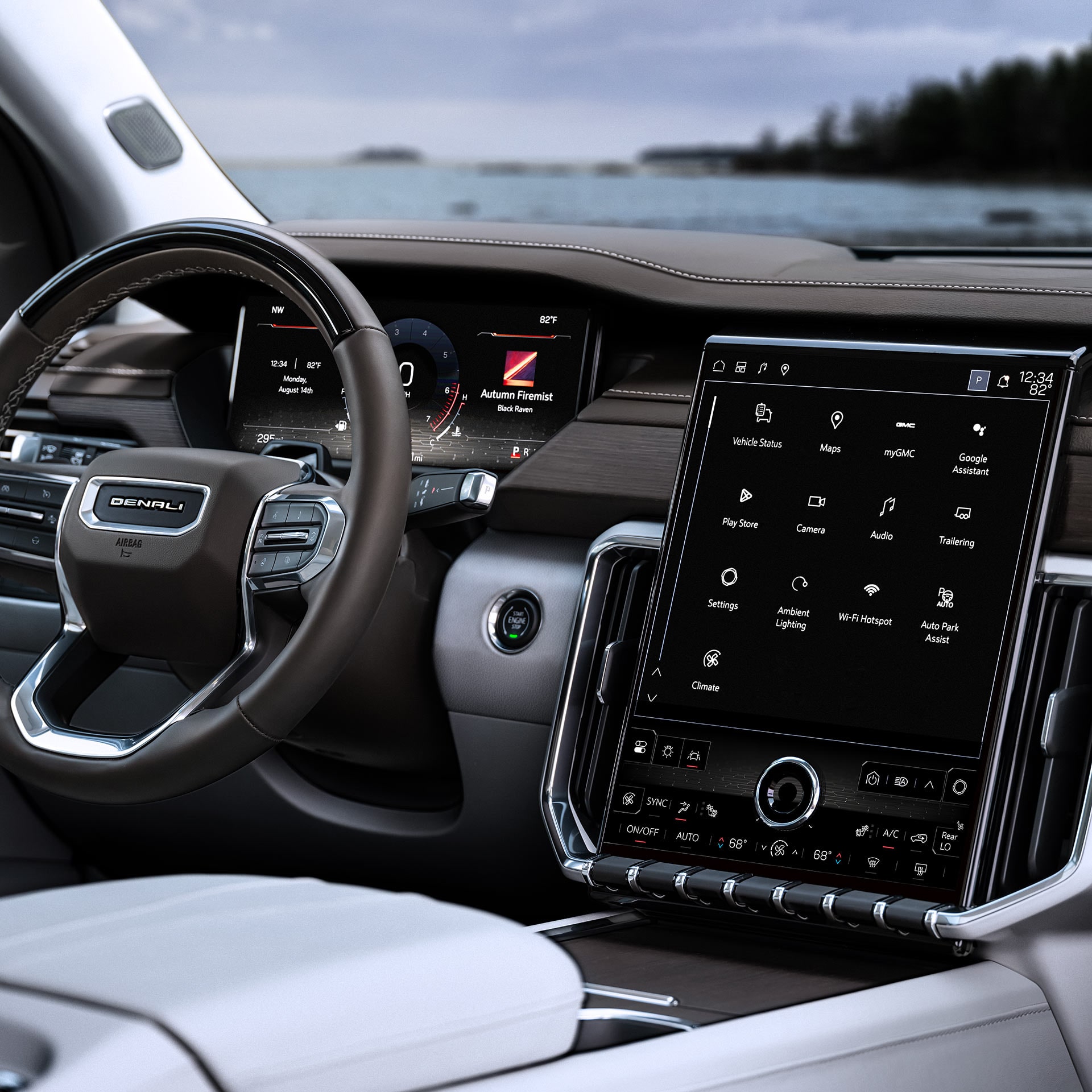 The Interior Cockpit of a GMC Denali Featuring a Steering Wheel a Digital Dashboard and a Large Infotainment Screen