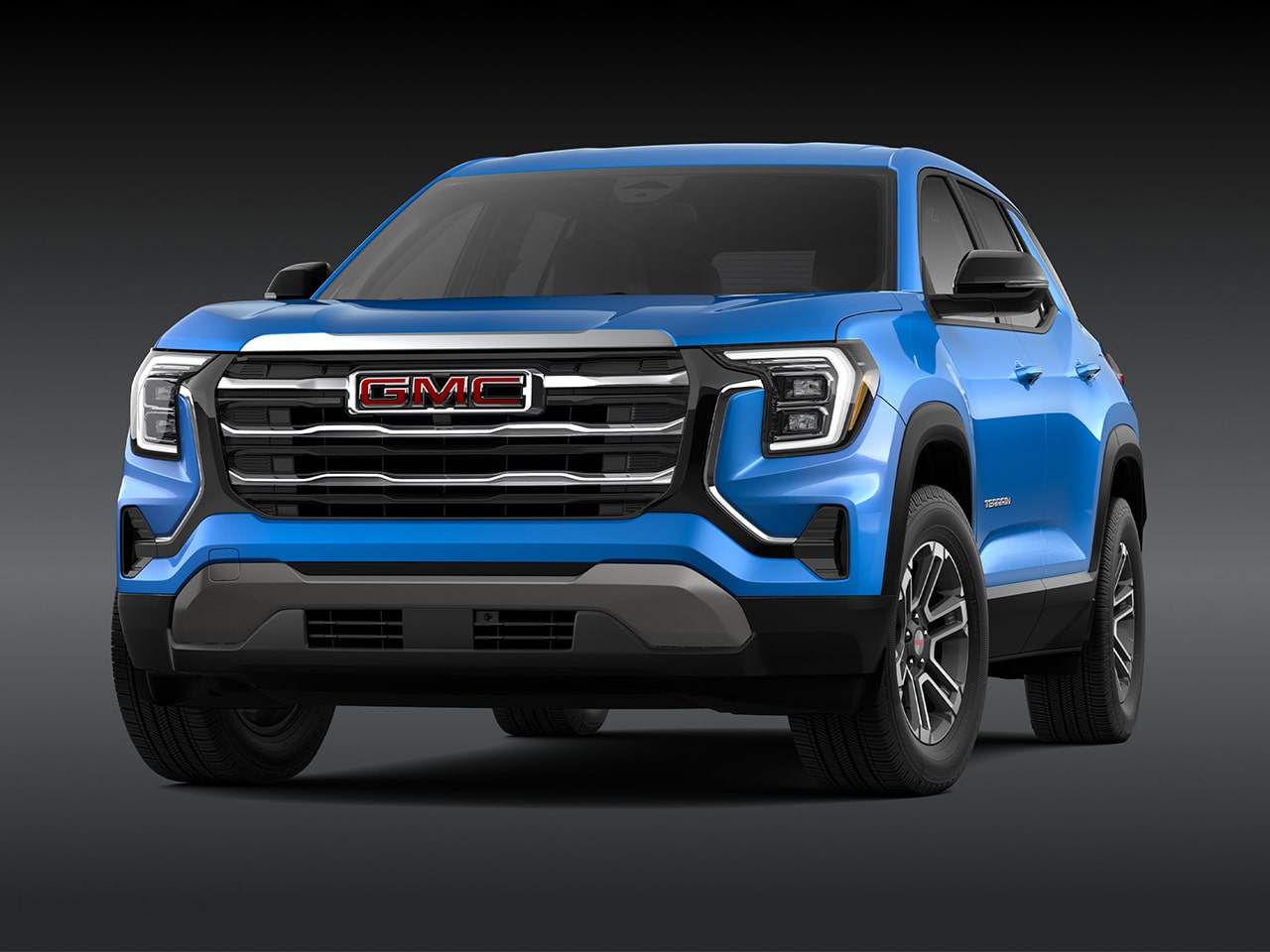 A Front View of a 2026 GMC Elevation SUV in Blue with a Chrome Grille